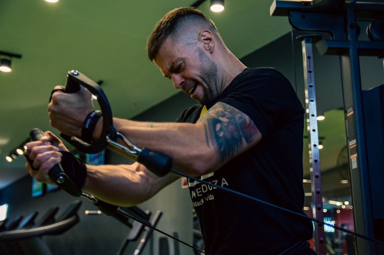 Athlete pushing through machine work
