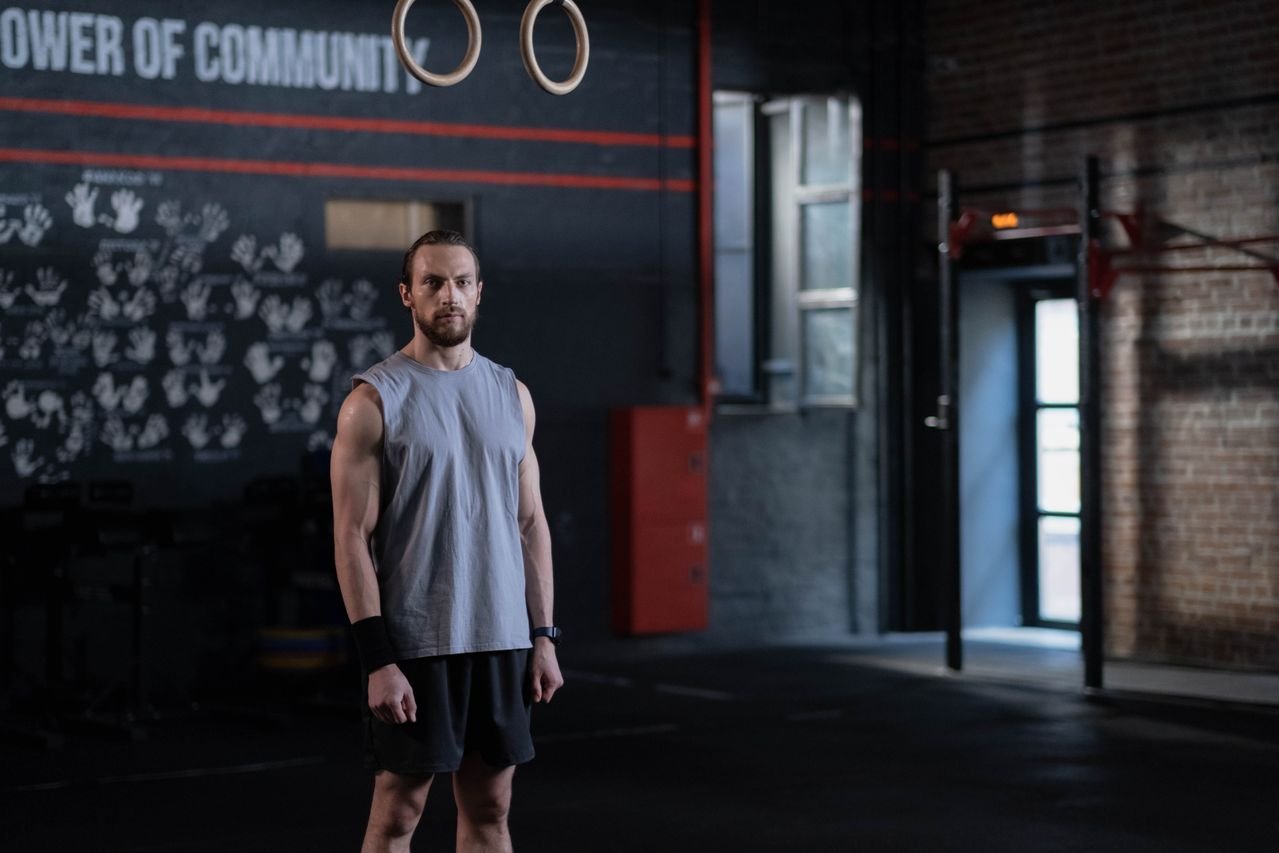 Athlete standing on the FORGE training floor